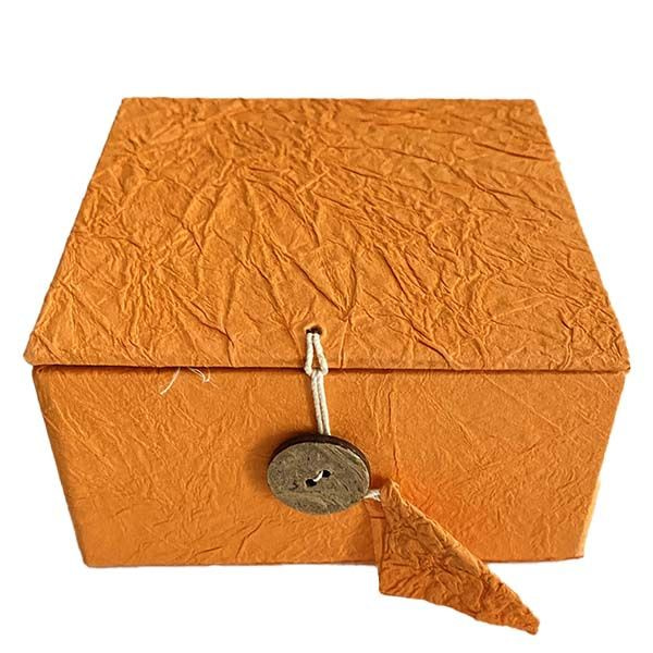 cuenco naranja con símbolo de chakras
